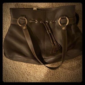 The SAK brown leather “pink label” purse.